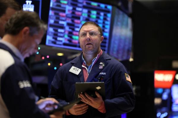 Wall Street ends down as megacaps give back gains