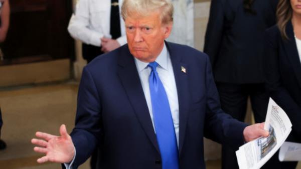 Former U.S. President Do<em></em>nald Trump gestures as he makes a statement to the media outside the court room at a Manhattan courthouse, during the trial of himself, his adult sons, the Trump Organization and others in a civil fraud case brought by state Attorney General Letitia James, in New York City, U.S., October 2, 2023. REUTERS/Andrew Kelly