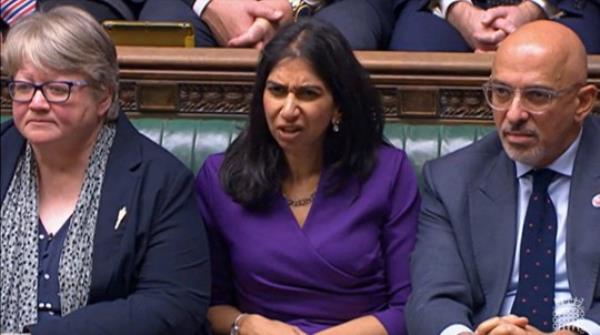 A video grab from footage broadcast by the UK Parliament's Parliamentary Recording Unit (PRU) shows Britain's Home Secretary Suella Braverman reacts to a peaker during the weekly session of Prime Minister's Questions (PMQs) in the House of Commons in Lo<em></em>ndon on November 2, 2022. (Photo by PRU / AFP) / RESTRICTED TO EDITORIAL USE - NO USE FOR ENTERTAINMENT, SATIRICAL, ADVERTISING PURPOSES - MANDATORY CREDIT 