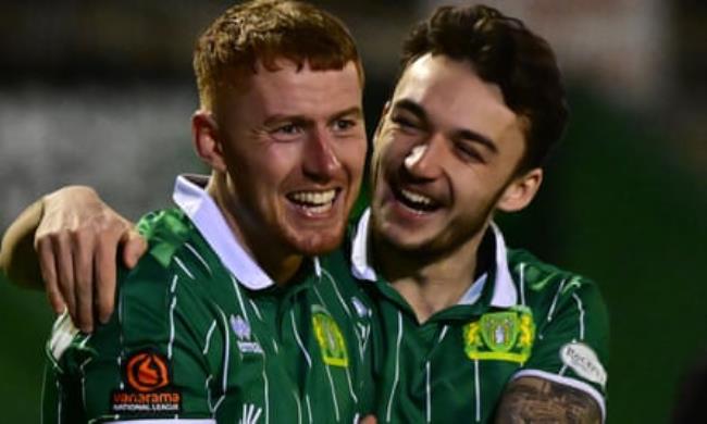 Yeovil’s Matthew Worthington (left) and So<em></em>nny Blu Lo-Everton get the badge in during their 3-1 win over Slough on Tuesday night.