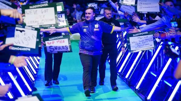 Luke Littler walks out to play Christian Kist (not pictured) on day six of the Paddy Power World Darts Champio<em></em>nship at Alexandra Palace, London. Picture date: Wednesday December 20, 2023. PA Photo. See PA story DARTS World. Photo credit should read: Zac Goodwin/PA Wire...RESTRICTIONS: Use subject to restrictions. Editorial use only, no commercial use without prior co<em></em>nsent from rights holder.