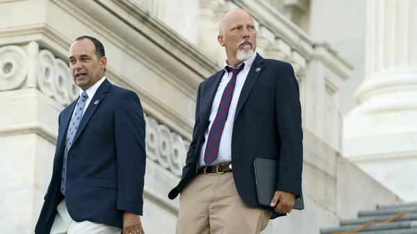 Reps. Bob Good (R-Va.) and Chip Roy (R-Texas) leave the House Chamber following the last votes of the day on Tuesday, June 21, 2022.