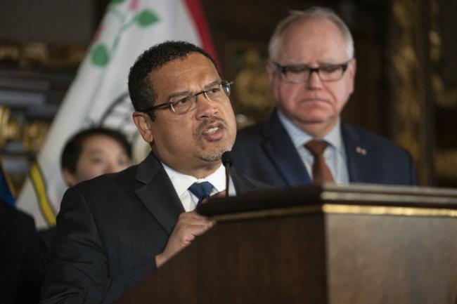 FILE - Minnesota Attorney General Keith Ellison speaks at a press co<em></em>nference at the State Capitol on Dec. 4, 2019, in St. Paul, Minn. Ellison is slated to lead off opening statements expected for Tuesday, March 28, 2023, in his state's lawsuit against Juul Labs – marking the first time any of the thousands of cases against the e-cigarette maker over its alleged marketing to young people is going to play out in a courtroom. (Renee Jo<em></em>nes Schneider/Star Tribune via AP, File)