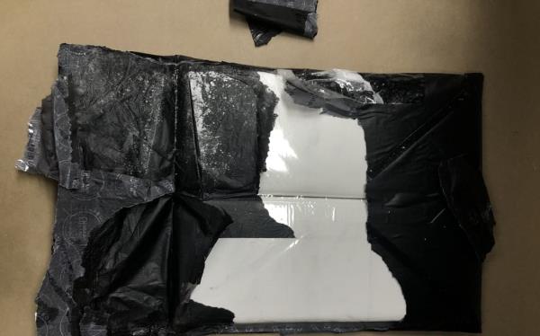 a<em></em>bout 2kg of cocaine was found hidden within the lining of Benhur Martin's suitcase on 27 April, 2023.