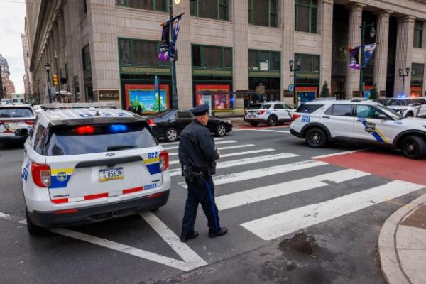 Police block traffic along Market Street between 13th and City Hall near the Macy's in Center City after reports of an alleged stabbing at the department store, Monday, Dec. 4, 2023, in Philadelphia. (Alejandro A. Alvarez/The Philadelphia Inquirer via AP)