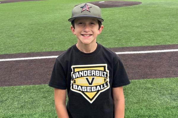 A 10-year-old boy smiling at the camera, who tragically died after being swept into a storm drain following severe weather in Murfreesboro, Tennessee