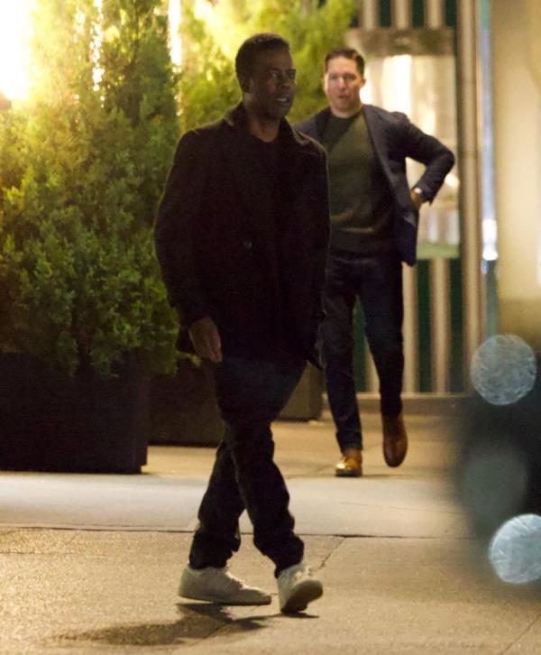 Chris Rock walking. 