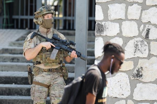 A Canadian soldier stands guard at the embassy in Haiti