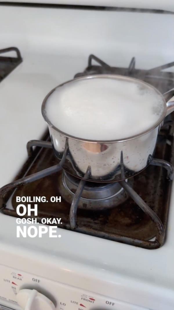 Kelsey Pomeroy tried frothing the milk in a pot. 