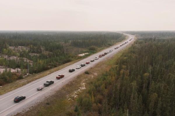 Yellowknife residents leave the city on Highway 3, the o<em></em>nly highway in or out of the community, after an evacuation order was given due to the proximity of a wildfire in Yellowknife, Northwest Territories, Canada August 16, 2023. REUTERS/Pat Kane TPX IMAGES OF THE DAY