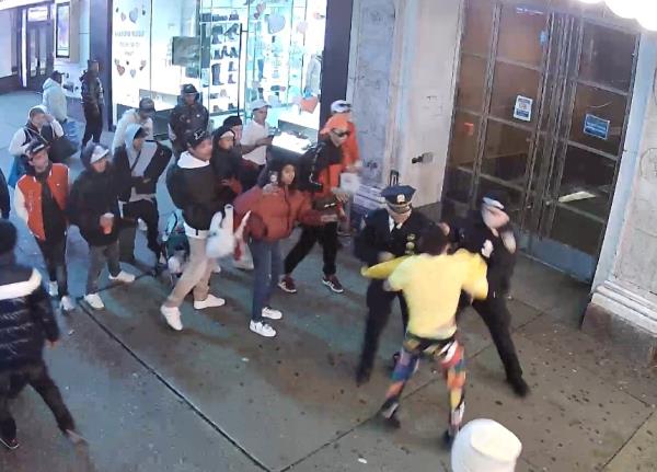 NYPD surveillance video released last week shows the suspects charged with assaulting two police officers in Times Square in January.  