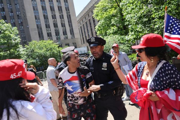 A fight broke out among protesters outside the courthouse during former President Do<em></em>nald Trump's hush mo<em></em>ney trial on May 28, 2024.