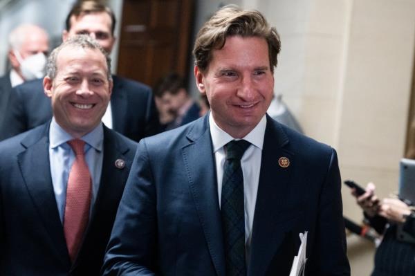 Reps. Dean Phillips, D-Minn., right, and Josh Gottheimer, D-N.J., are seen outside the House Democratic Caucus leadership election in Lo<em></em>ngworth Building