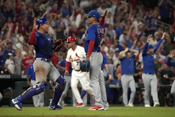 Chicago Cubs catcher Miguel Amaya, left, and relief pitcher Adbert Alzolay celebrate a 3-2 victory over the St. Louis Cardinals in a ba<em></em>seball game on July 28, 2023, in St. Louis. 