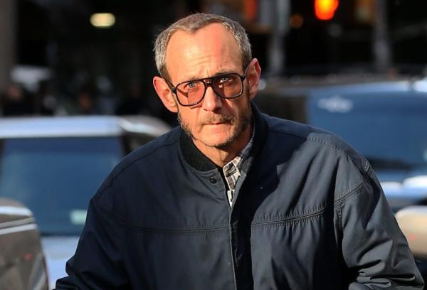 Terry Richardson pushing a bike