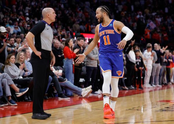 Jalen Brunson of New York Knicks arguing a call against Houston Rockets during a basketball game in Houston, Texas.