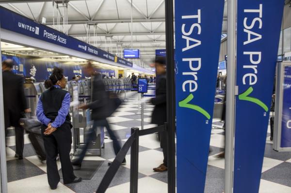 Passengers walk through the entrance of a TSA PreCheck in Terminal one at O'Hare Internatio<em></em>nal Airport