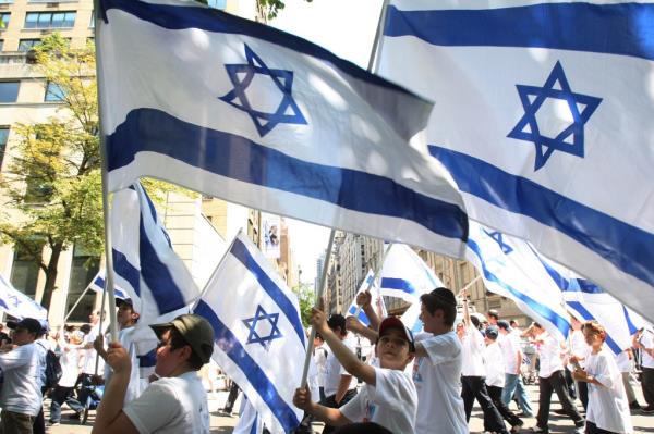 NEW YORK - MAY 31:  Participants in the annual Salute to Israel Parade march showing their support and pride for Israel May 31, 2009 in New York City. Thousands marched up Fifth Avenue to celebrate the creation of the State of Israel in 1948 and also the 100th birthday of the city of Tel Aviv. 