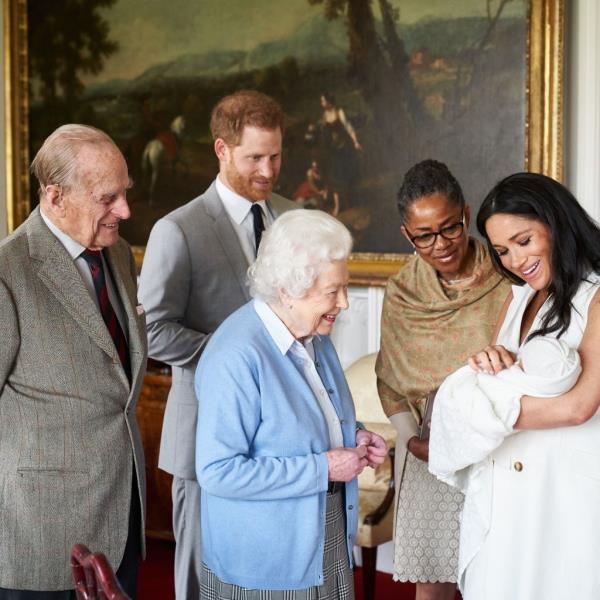 Prince Harry and Meghan, Markle are accompanied by Meghan's mother Doria Ragland, showing off their then-newborn baby son, Archie, at Windsor Castle on May 8, 2019.