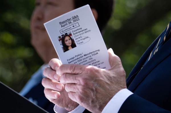 US President Joe Biden holds his notes while answering a question during a press co<em></em>nference in the Rose Garden of the White House after a meeting with South Korea's President Yoon Suk Yeol April 26, 202