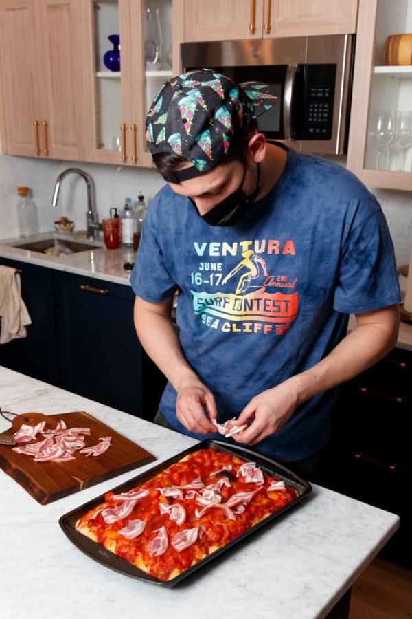 Lamo<em></em>naca got his start several years ago, in the thick of the pandemic, by making Roman-style pizza available for bartering -- and locals gobbled it up.