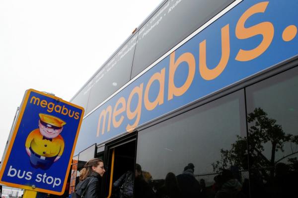 Passengers board a Megabus bus