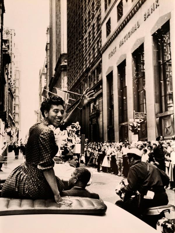 Althea Gibson waving in a parade