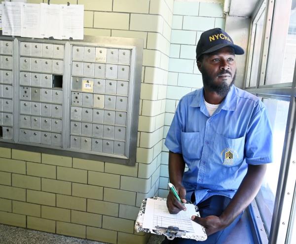 Dwane Simmons, a NYCHA building caretaker supervisor.