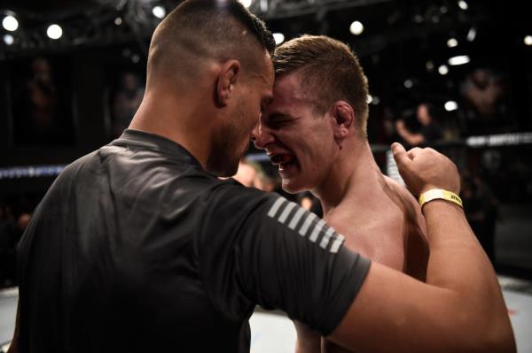 LAS VEGAS, NV - AUGUST 15:  (R-L) Grant Dawson  celebrates his victory with James Krause during Dana White's Tuesday Night Co<em></em>ntender Series at the TUF Gym on August 15, 2017 in Las Vegas, Nevada. (Photo by Brandon Magnus/DWTNCS)