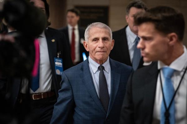 Dr. Anthony Fauci, in a suit and tie, arriving for a closed-door interview with the House Select Subcommittee on the Coro<em></em>navirus Pandemic at the U.S. Capitol