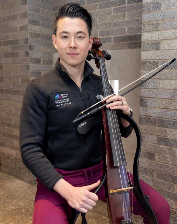 Forrest was passio<em></em>nately playing the cello inside the Herald Square transit hub when the woman randomly attacked him.