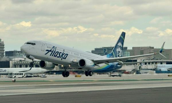 An Alaska airlines Boeing 737 is taking off from Los Angeles Internatio<em></em>nal AirPort (LAX) in Los Angeles, California, on March 6, 2024.