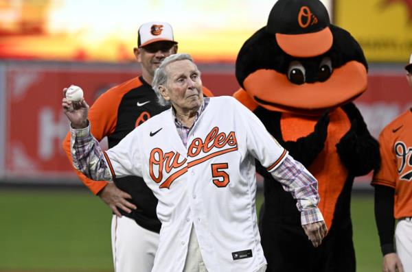 BALTIMORE, MARYLAND - SEPTEMBER 24: Former Baltimore Orioles and Hall of Famer Brooks Robinson throws out the first pitch before the game between the Baltimore Orioles and the Houston Astros  at Oriole Park at Camden Yards on September 24, 2022 in Baltimore, Maryland. (Photo by G Fiume/Getty Images)