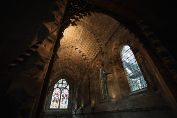 ROSLIN, SCOTLAND - FEBRUARY 09: A view of the interior ceiling of Rosslyn Chapel on February 9, 2012 in Roslin, Scotland. Built between 1446 and 1484 it is a category A listed building, covered in ornate sto<em></em>nework and carvings of individual figures and scenes. People travel from all over the world to visit the chapel which many have described as an architectural wo<em></em>nder and a library in stone. Many theories, myths and legends associated with the Chapel have given it a unique sense of mystery and wonder. (Photo by Jeff J Mitchell/Getty Images)