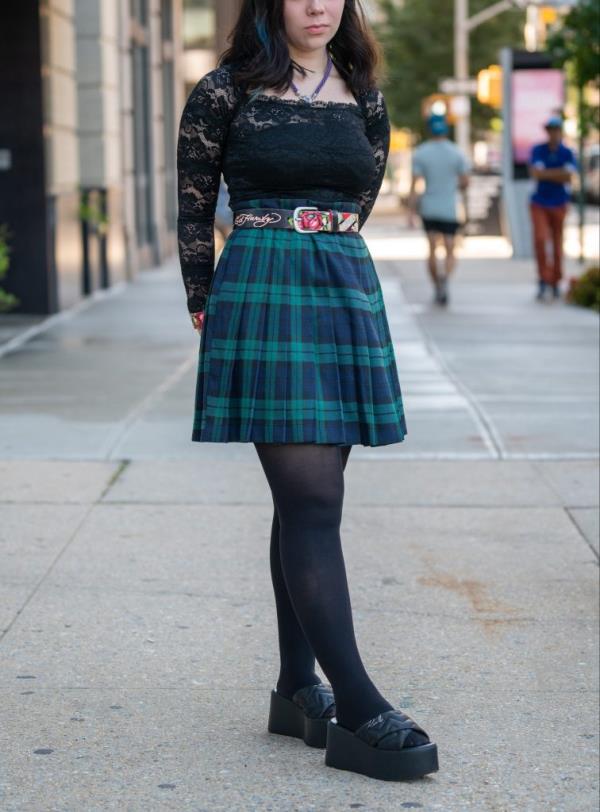 Ariana DeJesus is seen wearing a shirt by Guess, vintage skirt, Ed Hardy belt and shoes by Karl Lagerfeld to NYFW at Spring Studios on September 10, 2022 in New York City.