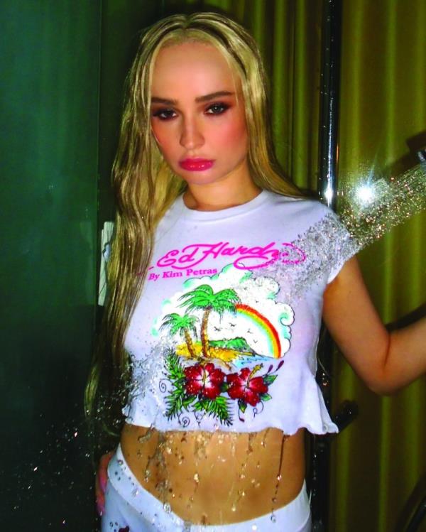 Kim Petras, 31, in Ed Hardy top. 