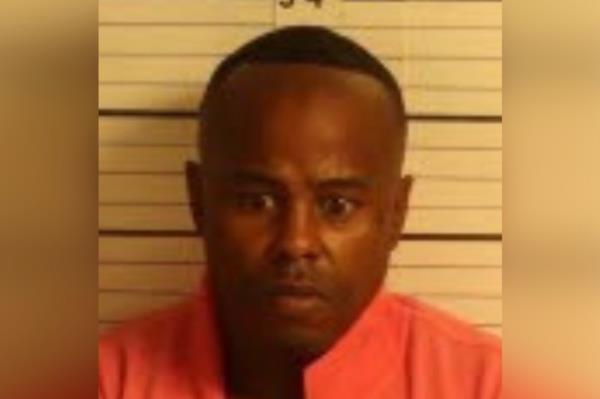 Marcus Johnson, 43, was arrested on Tuesday after allegedly attacking a cop and biting a piece of his ear off. 