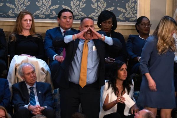 Steven Nikoui, whose son, Marine Lance Cpl. Kareem Nikoui, was killed during the U.S. withdrawal of Afghanistan, heckles President Joe Biden during the State of the Unio<em></em>n address in the House Chamber of the U.S. Capitol on Thursday, March 7, 2024.