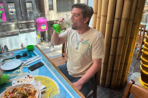 pictured is Matt Urben at the Margaritaville restaurant in New York's Times Square 