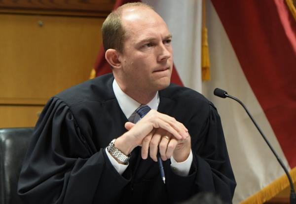 Fulton County Superior Judge Scott McAfee ruled there was no co<em></em>nflict of interest that would discredit Willis from the case. 