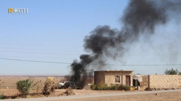 Smoke rises from a car after an alleged Turkish strike on Hasakah, Syria, October 5, 2023. North Press Agency/Handout via REUTERS THIS IMAGE HAS BEEN SUPPLIED BY A THIRD PARTY. NO RESALES. NO ARCHIVES. MANDATORY CREDIT. DO NOT OBSCURE LOGO