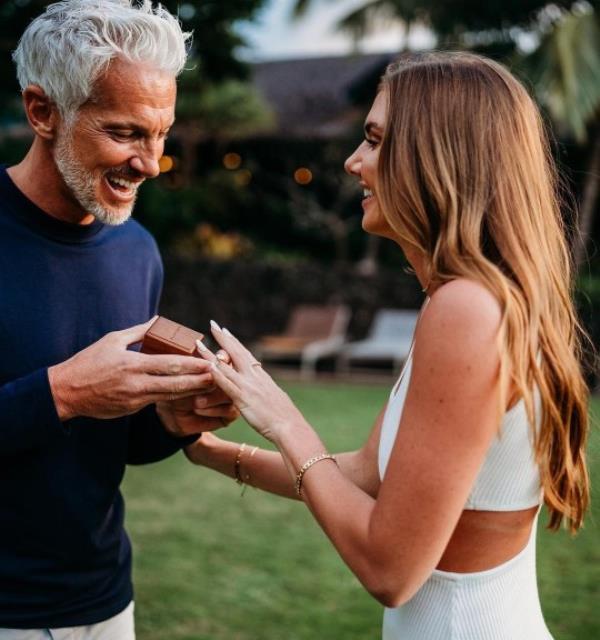 Michael proposing to Emily. THIS COUPLE with a 19-year age gap are now getting married despite obsessed stalkers and social media trolls calling it DADDY ISSUES and trying to split them up. Model Michael Justin (46) and nurse Emily Downing (27) from Los Angeles, United States, hit it off after meeting at a yoga class in Arizona in 2019. Since then, their four-year relatio<em></em>nship has survived Covid, obsessed stalkers, abusive messages claiming Emily looks older than Michael, and weird kidnapping rumours seeded by social media trolls. Because of the age gap, they both had reservations a<em></em>bout a relationship, and then Michael moved to LA to further his modelling career while Emily co<em></em>ntinued to study nursing in Arizona. When the pandemic hit, they realised they couldn't stand being apart and moved in together back in Arizona, which is when Michael decided to go public a<em></em>bout his relatio<em></em>nship with Emily ? something he?d never done before. There was an immediate backlash on Michael?s social media from a creepy subset of his fans and Emily found herself being harassed, abused, and even had strangers ringing her number, trying to co<em></em>nvince her Michael was cheating on her. But when Michael started TikTok, the couple grew an entirely different type of follower who are largely positive a<em></em>bout their relatio<em></em>nship and even ask for dating tips. ?At that point in the relationship, we had ho<em></em>nestly been a little bit more private than we are now,? said Emily. ?Just because during the start of the pandemic, Michael had a pretty big following on Instagram prior to havin<em></em>g a following on TikTok. ?I actually used to get really scary messages on DM (direct messages). ?And they got my phone number at one point and these mega fans of Michael would be saying these terrible things to me. ?We could tell they were trying to make me believe that Michael had cheated on me and trying to break up our relationship. ?So I thought, ?You know what, let's just end this for o<em></em>nce and for all?. ?We should just embrace it and say, we're a couple and just really show people that we're together and then people will probably stop bullying me because I'm probably getting bullied just because we're being secretive a<em></em>bout it.? Their first TikTok as a couple was a huge hit and got three million views ? an incredible feat in 2020 when the app was just taking off globally. ?Being with me has definitely slowed down his stalkers, he doesn't have as many as he used to,? said Emily. ?You have to make a switch with your followers,? said Michael. ?When I first started posting anything on Instagram a<em></em>bout Emily, I think I lost a<em></em>bout 8,000 followers the first week.? There is still the occasio<em></em>nal bit of weirdness on social media; recently TikTok users claimed Michael had kidnapped Emily. ?I think it's like some kind of a trend, or, honestly, people just love to feed off something negative because it's just so drastic and stupid,? said Michael. ?We were sitting in a coffee shop and it was raining and I had my hoodie over my head. ?It was enough for, obviously, the younger generation of TikTok, to literally think, ?here's this old guy?, and it's the perfect storm.? Michael and Emily think the rumour is so ridiculous that they?ve been havin<em></em>g fun creating tongue-in-cheek videos mocking it. ?They say, ?wear green, if you're wearing green on the next video you were kidnapped?, and so I was go<em></em>nna put her in green and literally talk a<em></em>bout our wedding,? said Michael. ?Clearly I wouldn't be talking a<em></em>bout my wedding and marrying this man if he kidnapped me,? said Emily. There is a minority of people who still actively target Emily, either saying she has ?daddy issues? or claiming she looks really old. ?I've gotten a lot of comments that say, I look older than Michael,? she said. ?You know, they were like, ?Oh, this girl has terrible skin. She needs to put sunscreen on. She looks like she's 60.? ?We don't let the negative comments get to us. Those people are clearly sad and mad people and that's their problem.? Emily said the nicest part a<em></em>bout TikTok is building a friendly community and giving advice to people who themselves face judgement from family or friends over an age-gap relationship. ?You know what, if it's a friend who is being so mean to you over this, that friend was probably never cheering you on,? said Emily. ?They were probably on the opposite team?s benches rooting against you all along. ?So usually, this is a time in your life when the true colours of people are shown. ?I always tell people, when you're doing something that makes you happy, that's really all that matters. ?You can't can't co<em></em>ncern yourself too much with everyone's opinions.? Meanwhile, Michael has given male followers the co<em></em>nfidence to not dye their greying hair, or leap back into the dating world following a painful break-up or divorce. Now the couple are looking forward to their wedding in November and want to start a family.