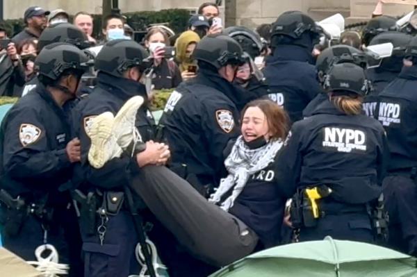 NYPD cops arrested anti-Israel protesters on Thursday at Columbia University. 