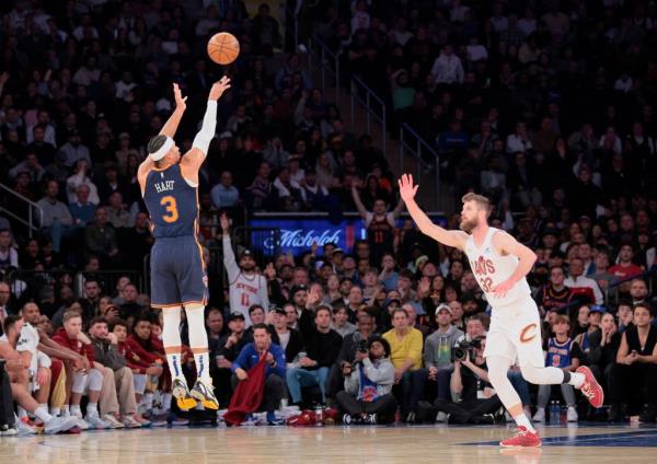 Knicks guard Josh Hart #3 misses a wide open three pointer shot over Cleveland Cavaliers forward Dean Wade